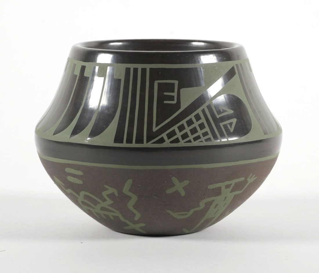 Than Tsideh, San Ildefonso Pueblo Vase: Stunning pottery jar with olive green on black by Than Tsideh, aka Erik Fender (Native American, b. 1970). Measures about 4" high, 5-1/2" diameter. This item can be shipped in-house.