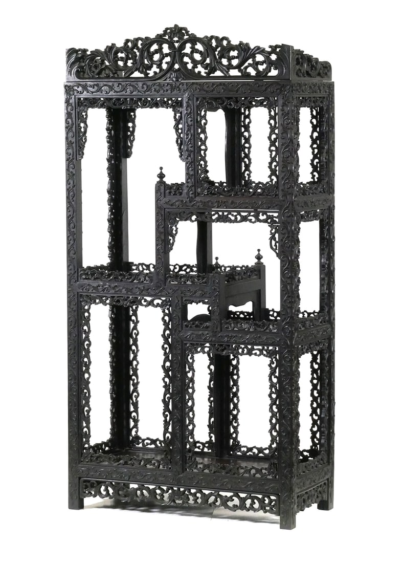 Chinese Carved Display Cabinet, Etagere: Chinese ornately carved open curio cabinet. Cabinet features four shelves with carved floral scrollwork. Display measures approx. 60" tall x 30-1/4" wide x 13-3/4". This item will need to be shipped b