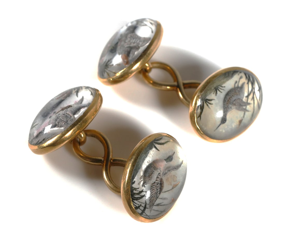 18K Gold Essex Crystal Reverse Intaglio Cufflinks: Pair of 18 karat yellow gold antique Essex crystal reverse carved and painted intaglio cufflinks depicting birds in flight. Bird hunting motif with duck and pheasant on each cufflink. Marked with 18 i
