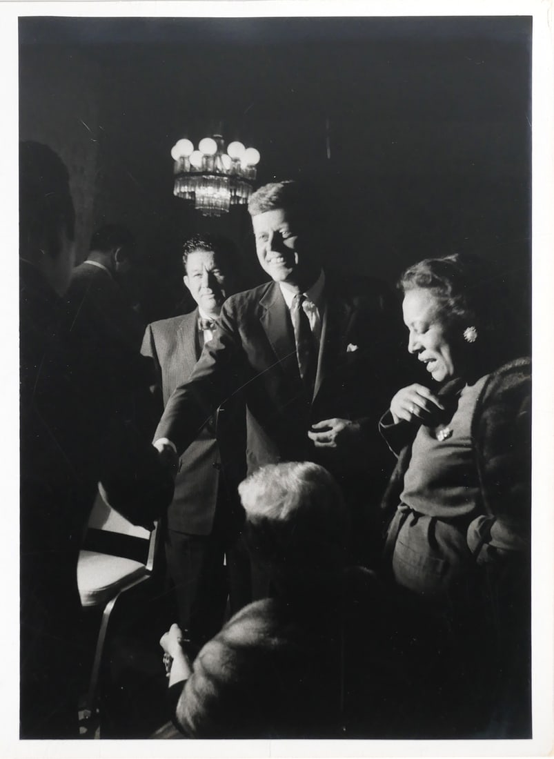 JOHN F. KENNEDY, Jacques Lowe Photo: Rare original Type I black and white 8x10 photograph of JFK by Jacques Lowe, his personal photographer. Lowe's stamp on verso. Shows Kennedy greeting supporters. Provenance: From an unidentified membe