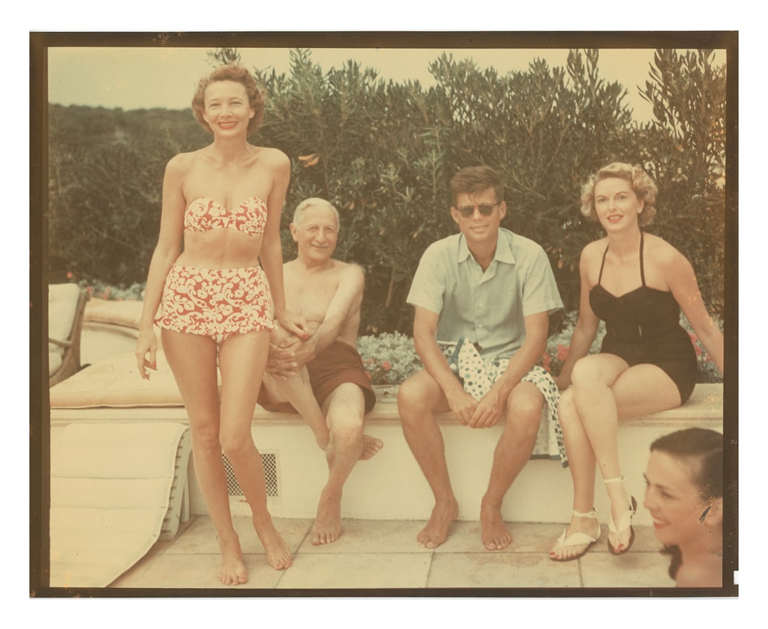 JOHN F. KENNEDY, Jacques Henri Lartique Photo: Original Type I 8x10 color photograph of John F. Kennedy, taken by photographer J.H. Lartique (French, 1894-1986). Taken at Henri Dubonnet's home on the French Riviera in August 1953. Subjects (l-r) i