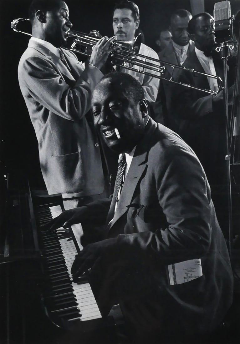 JAMES P. JOHNSON, Wilbur de Paris Photograph: Large black and white photograph of James P. Johnson, Wilbur de Paris and Others at Jam Session by Gjon Mili. Image measures 18-1/2" x 13", frame measures 26-1/2" x 21". This item will need to be ship