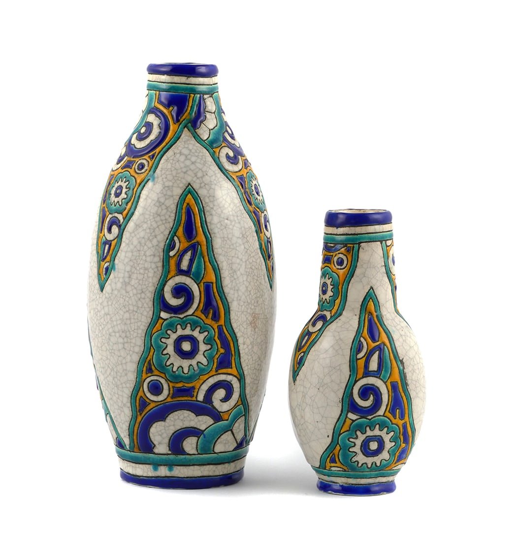 CHARLES CATTEAU Boch Freres Vases (2): Two Charles Catteau for Boch Freres Art Deco vases with the same decoration. Two varying forms of early 20th century Belgian art pottery, one bottle vase and the other ovid, each incised and enameled