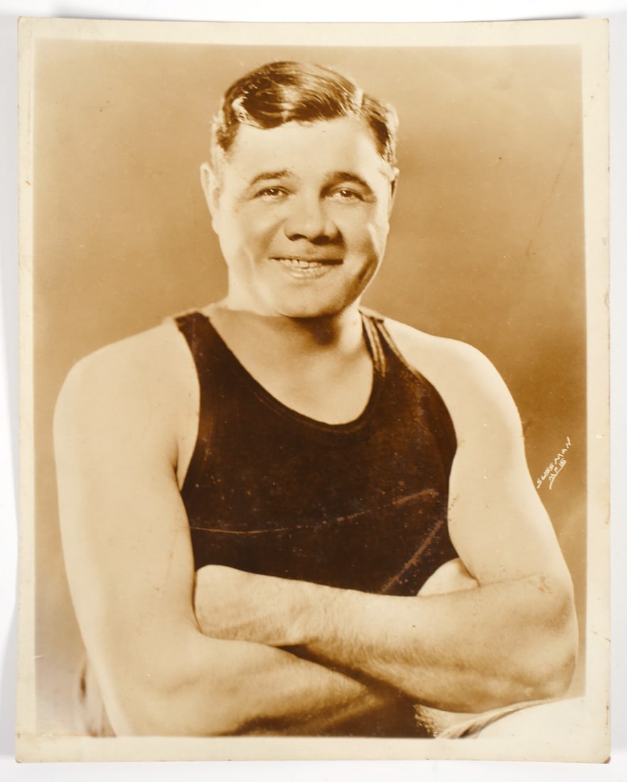 BABE RUTH Original Type I Photo, 1927 by Sussman: One of Babe Ruth's earliest endorsements was for Babe Ruth All-American Underwear. In 1927, this famous photo of a young Bambino was taken by Sussman and used to advertise his underwear line. Measures