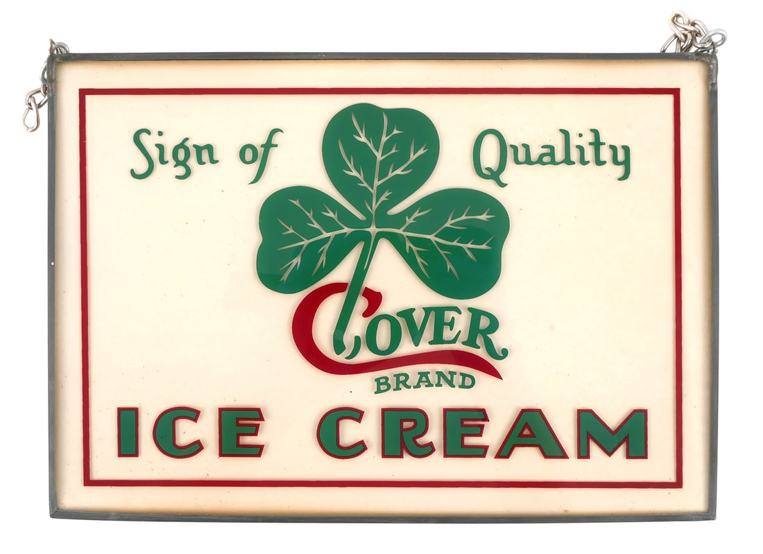 CLOVER BRAND Reverse Painted Glass Sign: Vintage Clover Brand reverse painted glass advertising sign. Sign reads "Sign of Quality Clover Brand Ice Cream". Metal frame with hanging chains. Sign measures approx. 10" x 7". This item can be ship