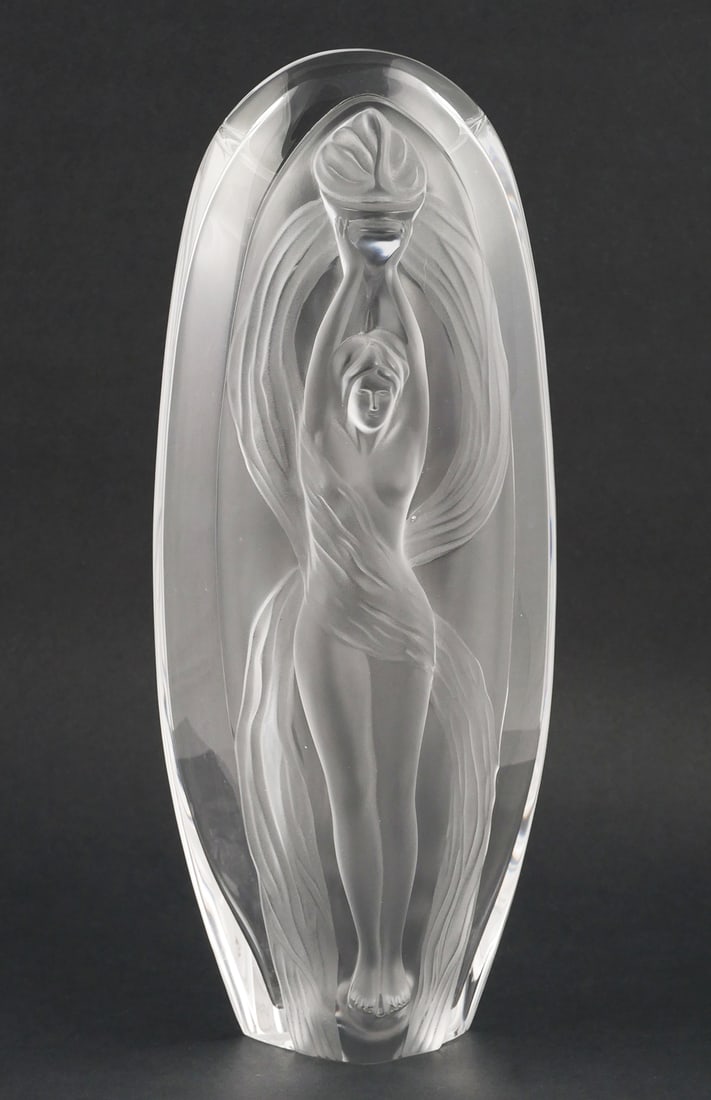 Marie-Claude LALIQUE Draped Nude Vase: A Marie-Claude Lalique for Lalique vase.Frosted and clear crystal vase with relief draped nude holding a torch aloft. 13.5" high. Signed on bottom of back side. This item can be shipped in-house.