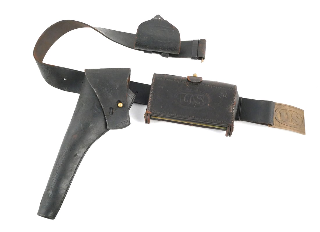 Indian Wars US Belt, Holster, Cartridge Box: Indian Wars cavalry soldier's belt, with holster, cartridge box for .45-70 rifle rounds and presumably a Civil War era cap box. Brass buckle, and the three leather accessories all stamped US. All of t