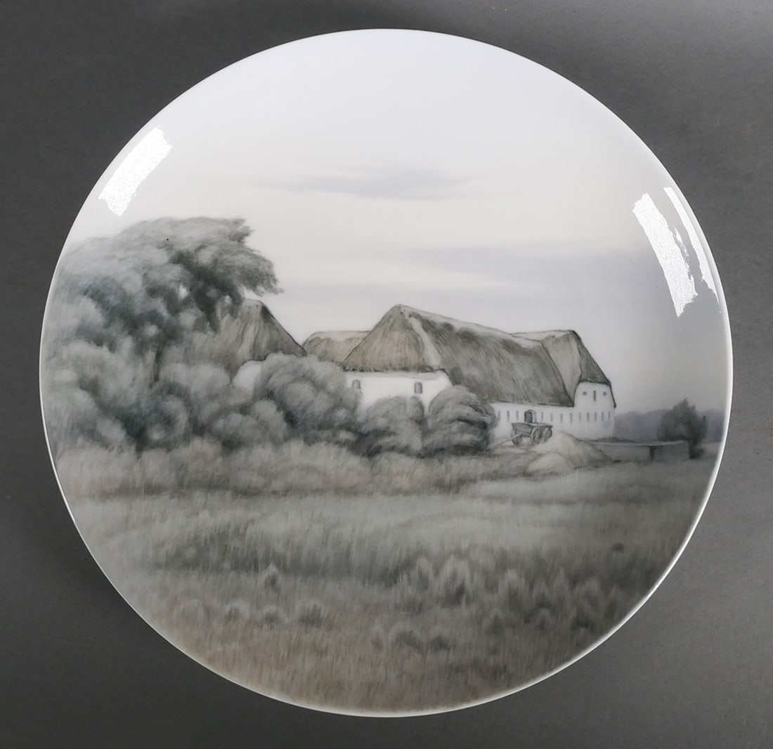 1927 Royal Copenhagen STEPHAN USSING Charger: Dated 1927 Royal Copenhagen handpainted art plate depicting a Scandinavian town scene, by Stephan Peter Jakob Hjort Ussing (Danish, 1868-1958). Signed "St. Ussing" and dated on back under strong RC ma