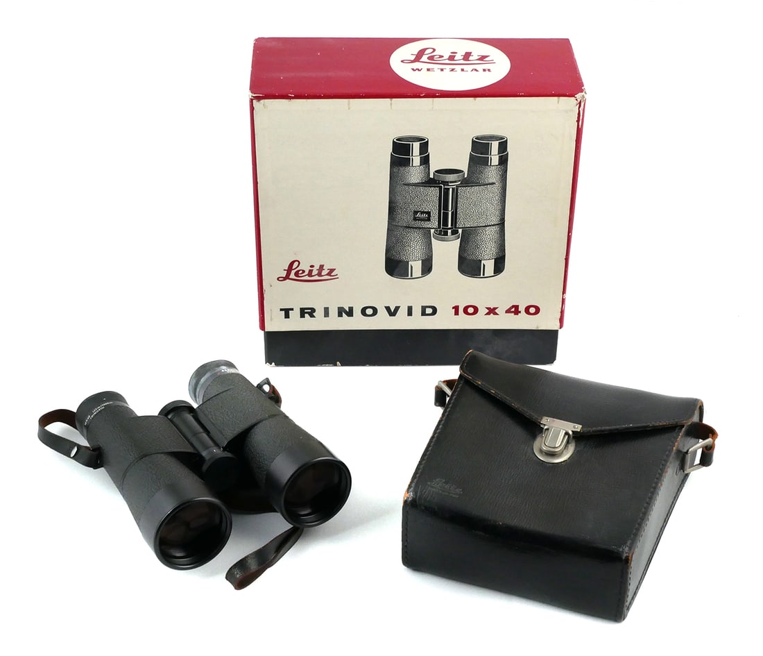Leitz Trinovid 10x40 122m/1000m Binoculars: German Leitz binoculars with case and box. Binoculars approx. 5-3/4" x 4" to 4-3/4". This item can be shipped in-house.