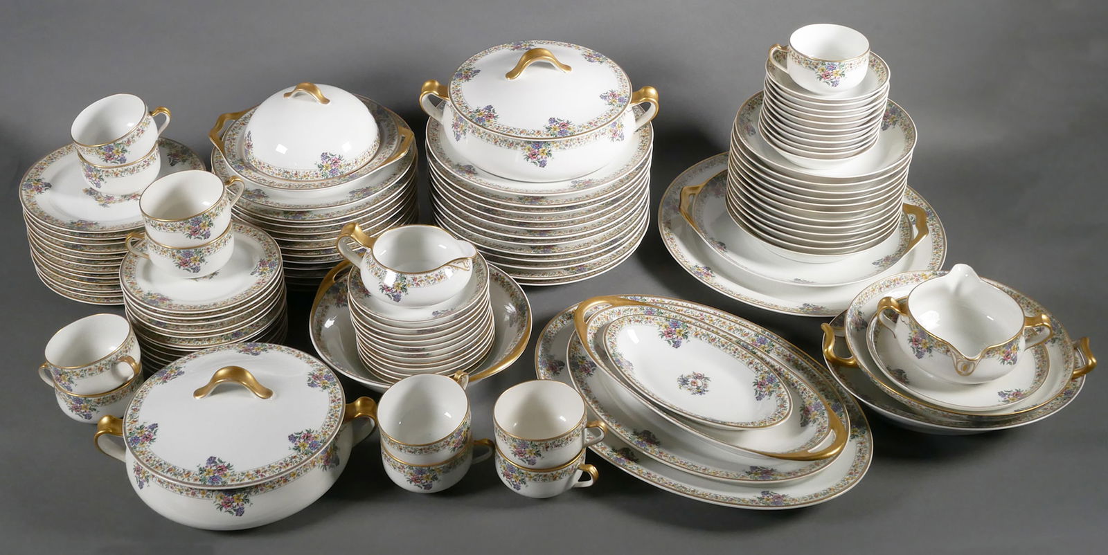 "Narcissus" Haviland Limoges China 107 Pcs: Set of "Narcissus" pattern china including: dinner, luncheon, salad, and bread and butter plates, coupe soup bowls, fruit or dessert sauce bowls, flat cup and saucer sets, round butter with strainer,