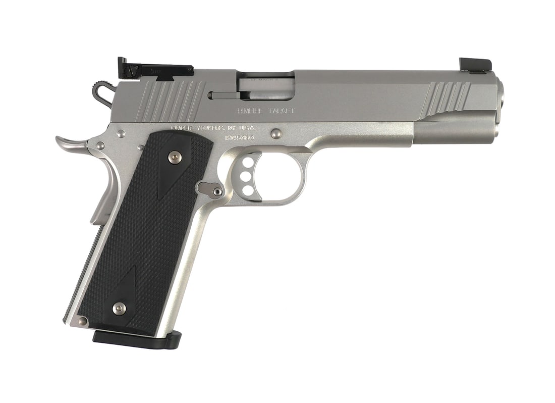 KIMBER Rimfire Target 17 Mach 2 Pistol: Kimber 1911-A1 style Rimfire Target pistol chambered in .17 Mach II. Barrel measures approx. 5-1/8", serial #K145393. Includes Original plastic case, documents, lock, and one factory magazine. This it