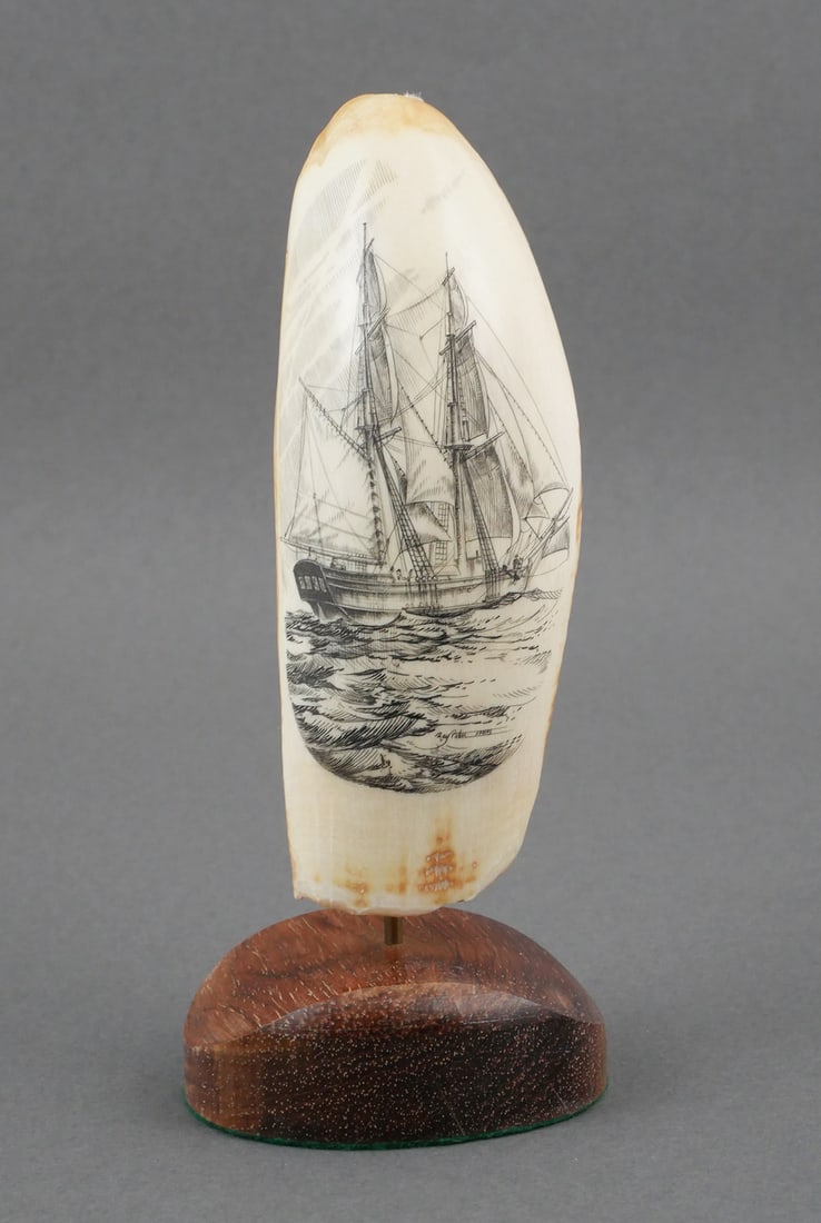 RAY PETERS Scrimshaw Ship at Sea: Signed by Ray Peters, depicting a sailing ship at sea. Signed within the image, lower right. 3" x 6-7/8". Provenance: Obtained in the 1980s from Lahaina Scrimshaw Factory, Lahaina, Hawaii. This item c