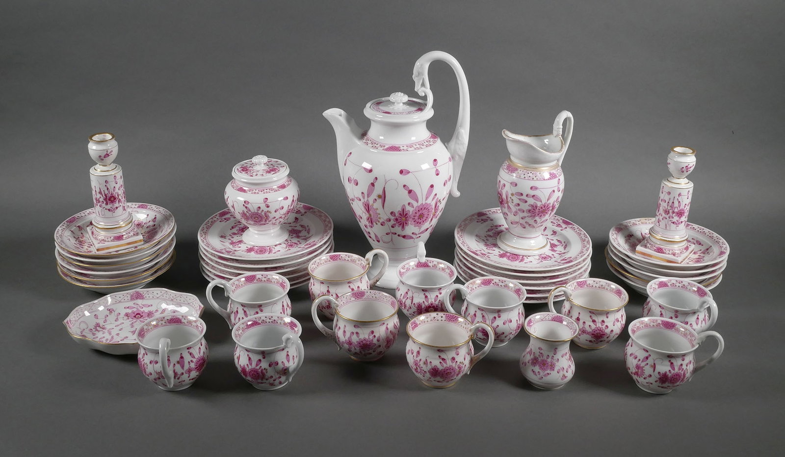 Antique MEISSEN Coffee Tea Set 41 pcs: Meissen purple floral coffee or tea service in the pattern Oriental or Indian Flowers. The set features a 11-1/2" coffee pot with swan neck handle. Service for 11, 41 pcs total. Bottoms are marked wit