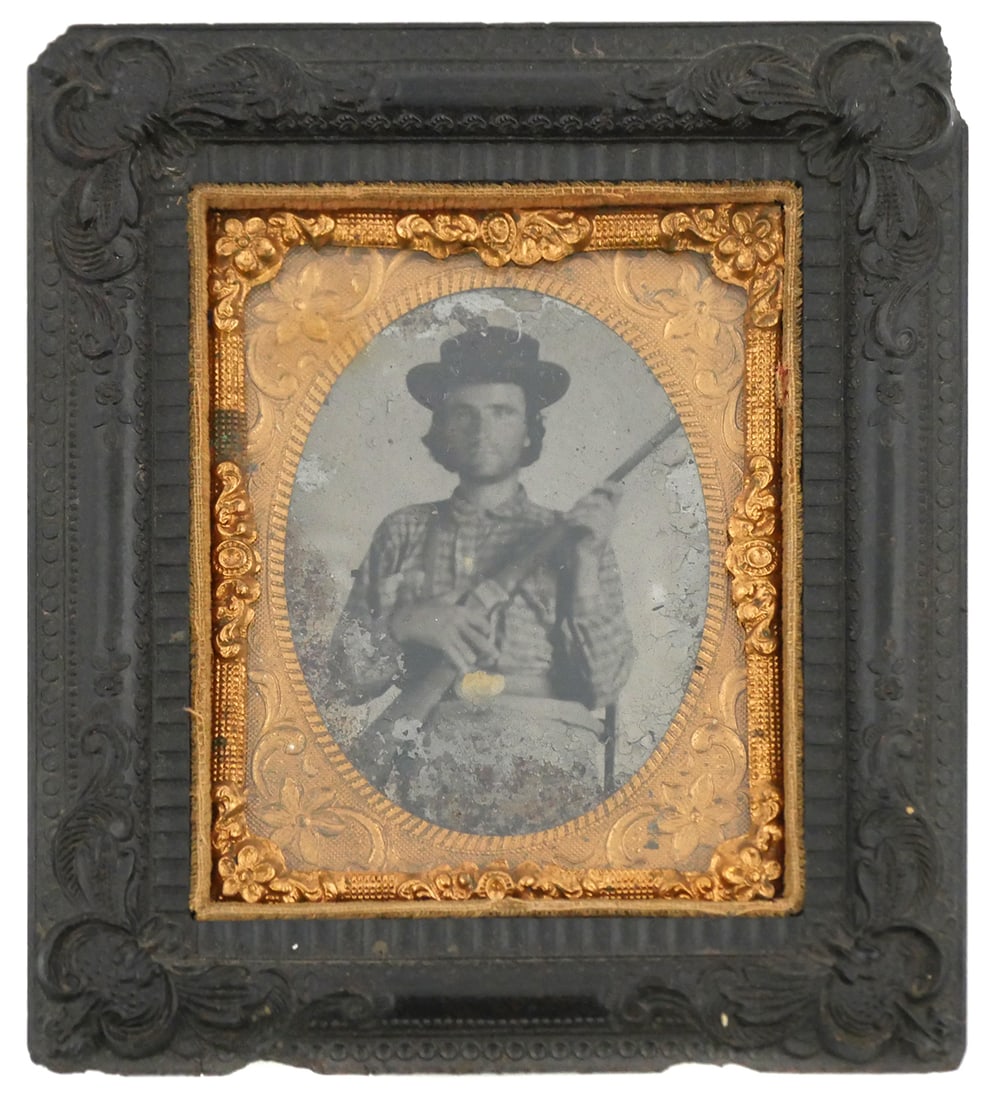 Civil War: Confederate Soldier Presumed Florida: Civil War era tintype of a Confederate soldier wearing a plaid "Olustee Battle Shirt", holding a Sharps carbine rifle. Seated man holding his weapon, with a blanket draped over his lap. These plaid sh