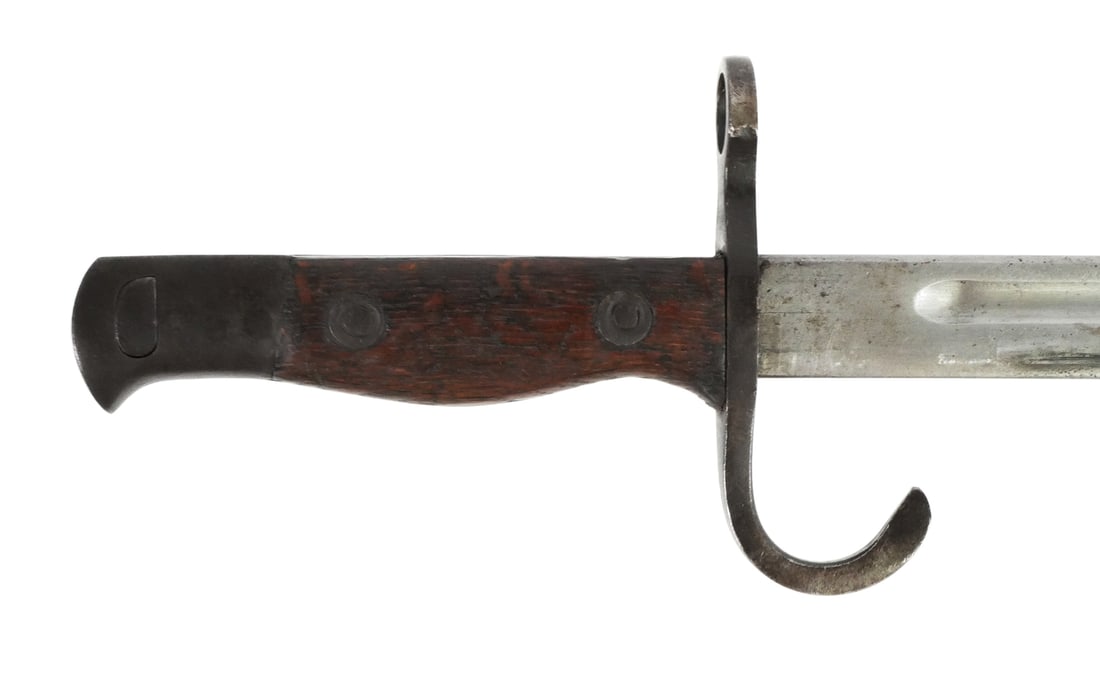 Japanese Type 30 Bayonet Unmarked Arsenal: Blade measures approx. 15", overall length 19-3/4". This late-war Japanese Type 30 bayonet features a bright steel, fullered blade, a straight guard with hooked quillon, and riveted wooden grips. The 