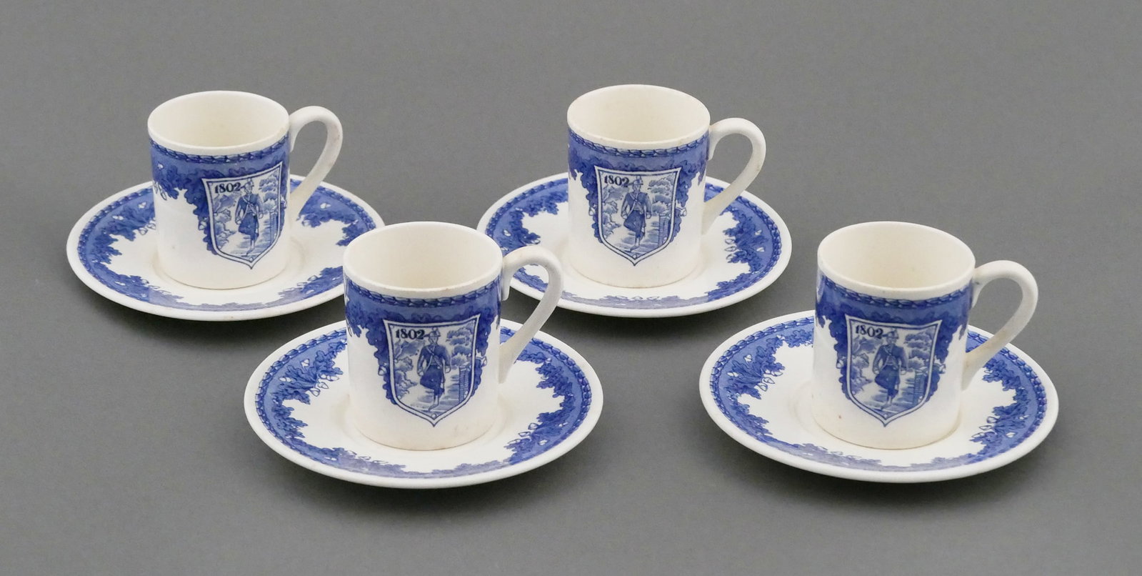 West Point Cups & Saucers, Gen. Yarborough: From the personal collection of General William P. Yarborough. Fine Wedgwood demitasse set consisting of four blue and white cups with matching saucers, produced for the United States Military Academy
