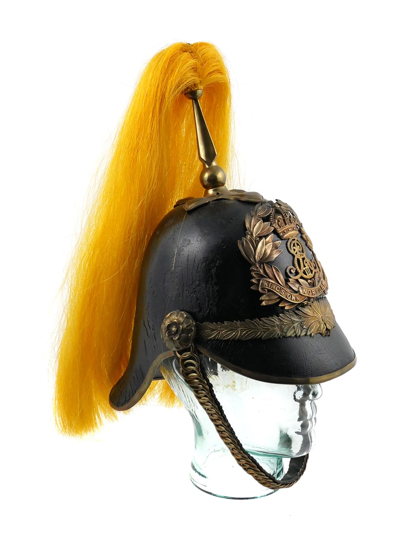 1902 British Edward VII Helmet: A King's Own Norfolk Imperial Yeomanry Trooper Helmet, Special Pattern 1902 - 1903. Edwardian helmet, black leather with brass fittings and yellow horsehair plume. Brass helmet plate with a crowned E.
