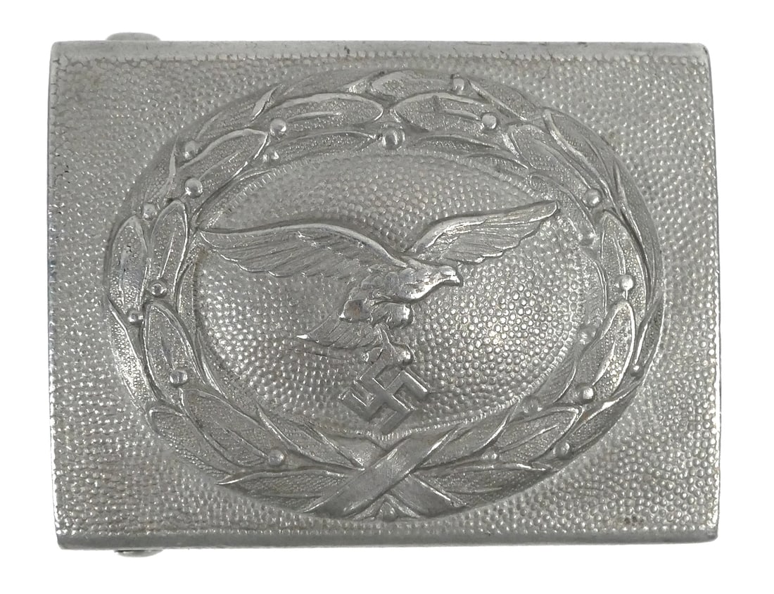 WWII: Luftwaffe Belt Buckle: Second pattern RS&S unmarked aluminum Luftwaffe buckle. This item can be shipped in-house.