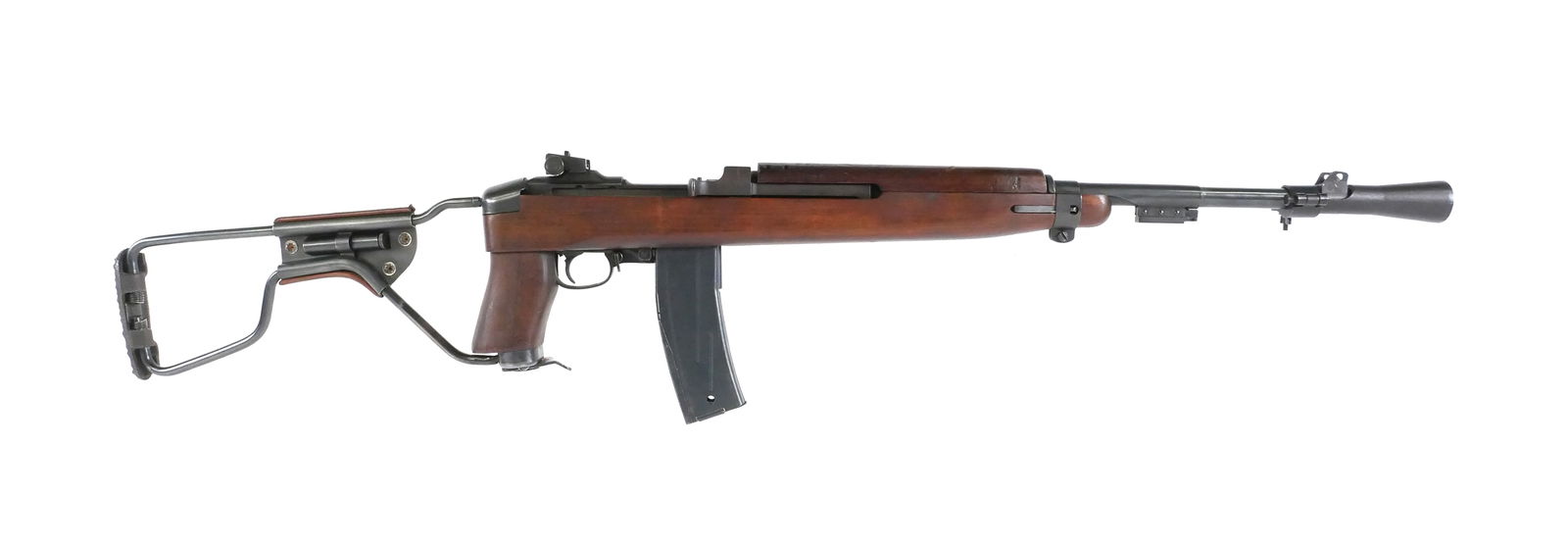 WWII Inland M1A1 Carbine .30 Rifle: WWII-era U.S. M1A1 Carbine chambered in .30 caliber, manufactured by Inland Division of General Motors. Receiver marked "INLAND DIV. U.S. CARBINE CAL. .30 M1," serial number 4940766. Barrel marked "IN