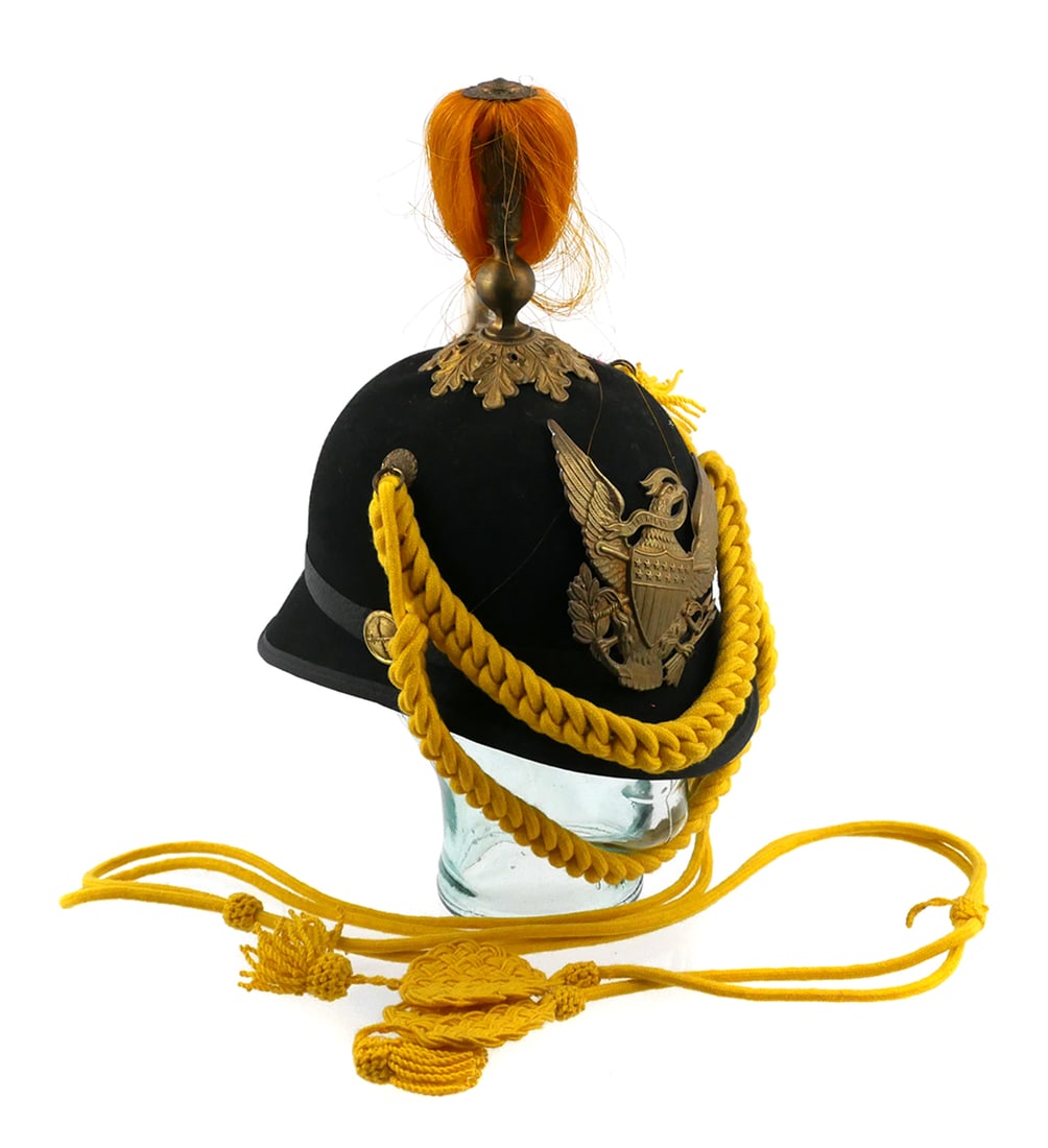 U.S. M81 Cavalry Dress Helmet Reproduction: Modern reproduction of the United States Model 1881 dress ceremonial parade pith helmet with spike and horsehair plume. Front with brass plate, great seal with American eagle holding a ribbon reading