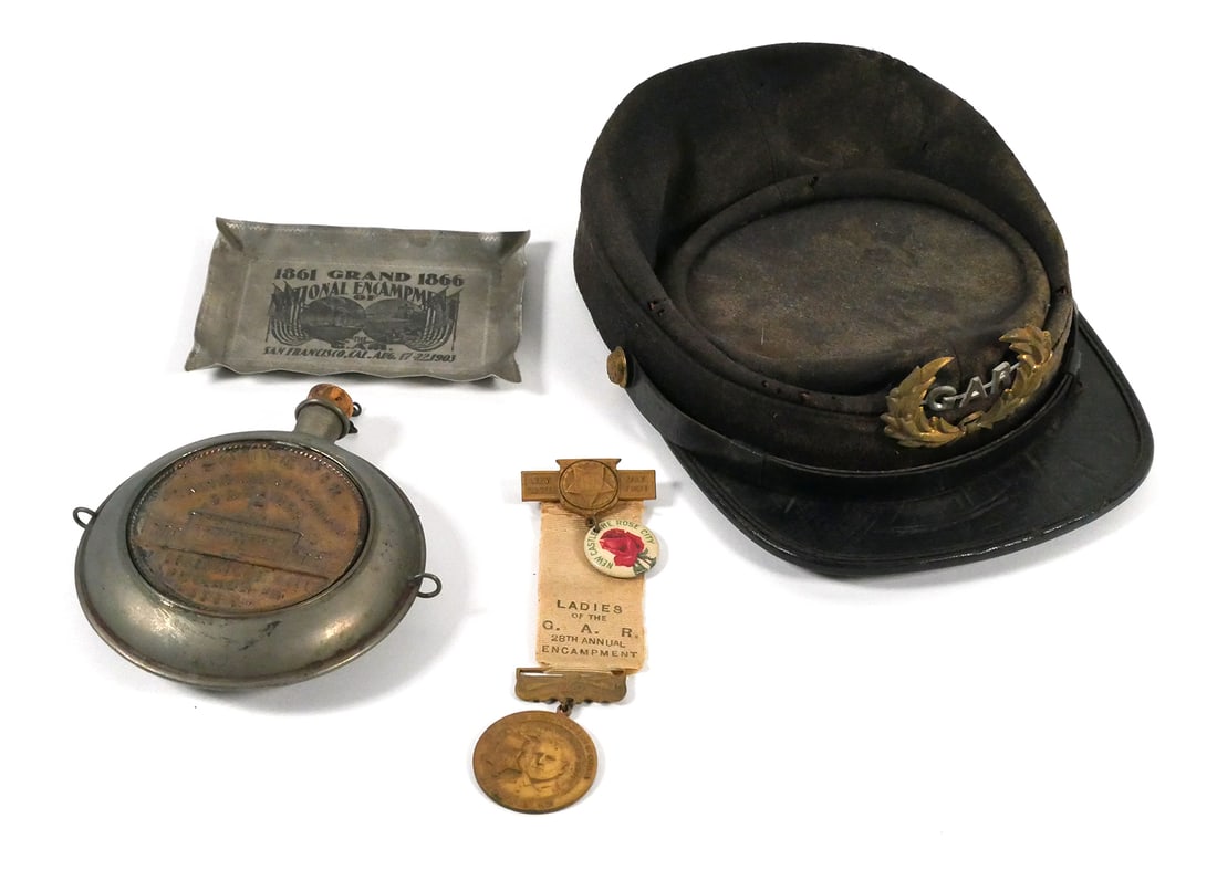 [Civil War]: Lot of GAR Items: Grand Army of the Republic items, including a kepi with badge, a 1903 ashtray, an 1899 Philadelphia Encampment flask and a 1921 Ladies of the GAR medal. This item can be shipped in-house.