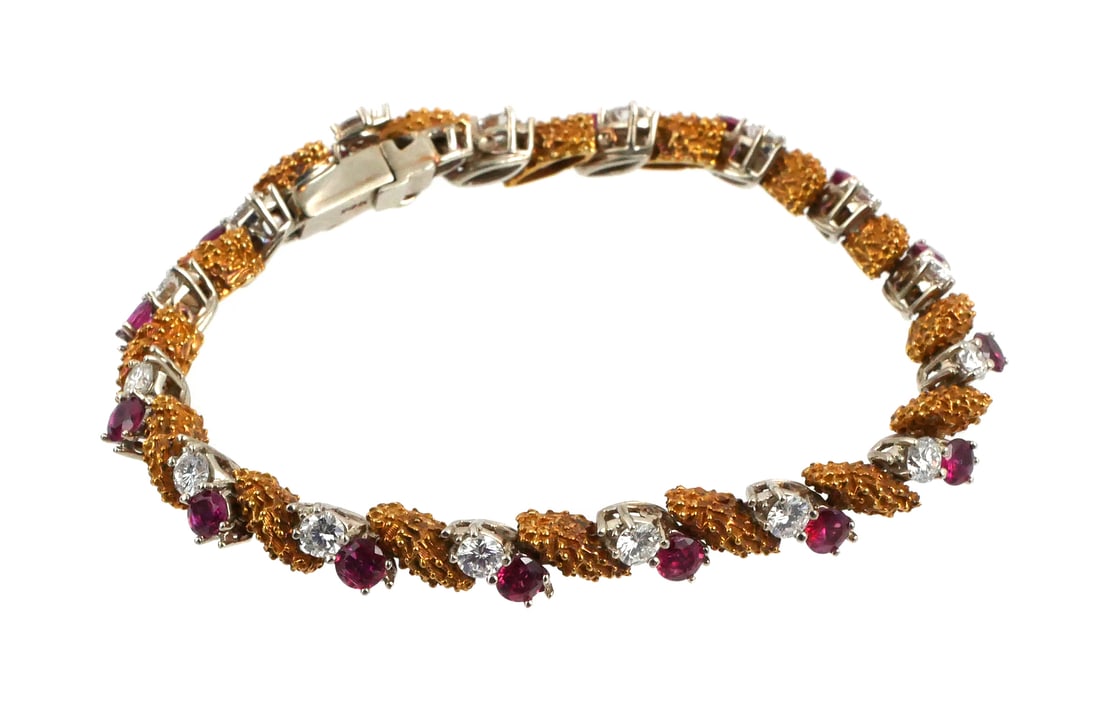 14K Rose Gold Diamond & Ruby Tennis Bracelet: Retro design mid to late 20th century 14 karat rose and light gold set with rubies and diamonds. Textured oval panels, 16 rubies and 16 diamonds, each stone just under 1/4 carat. One of a kind design.