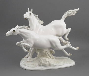 Hutschenreuther TWO HORSES Figurine: Vintage porcelain galloping horses statue by Hutschenreuther. Measures 15-1/2" long and 11" high. This item will need to be shipped by a packing company of your choice. We maintain a list of reliable