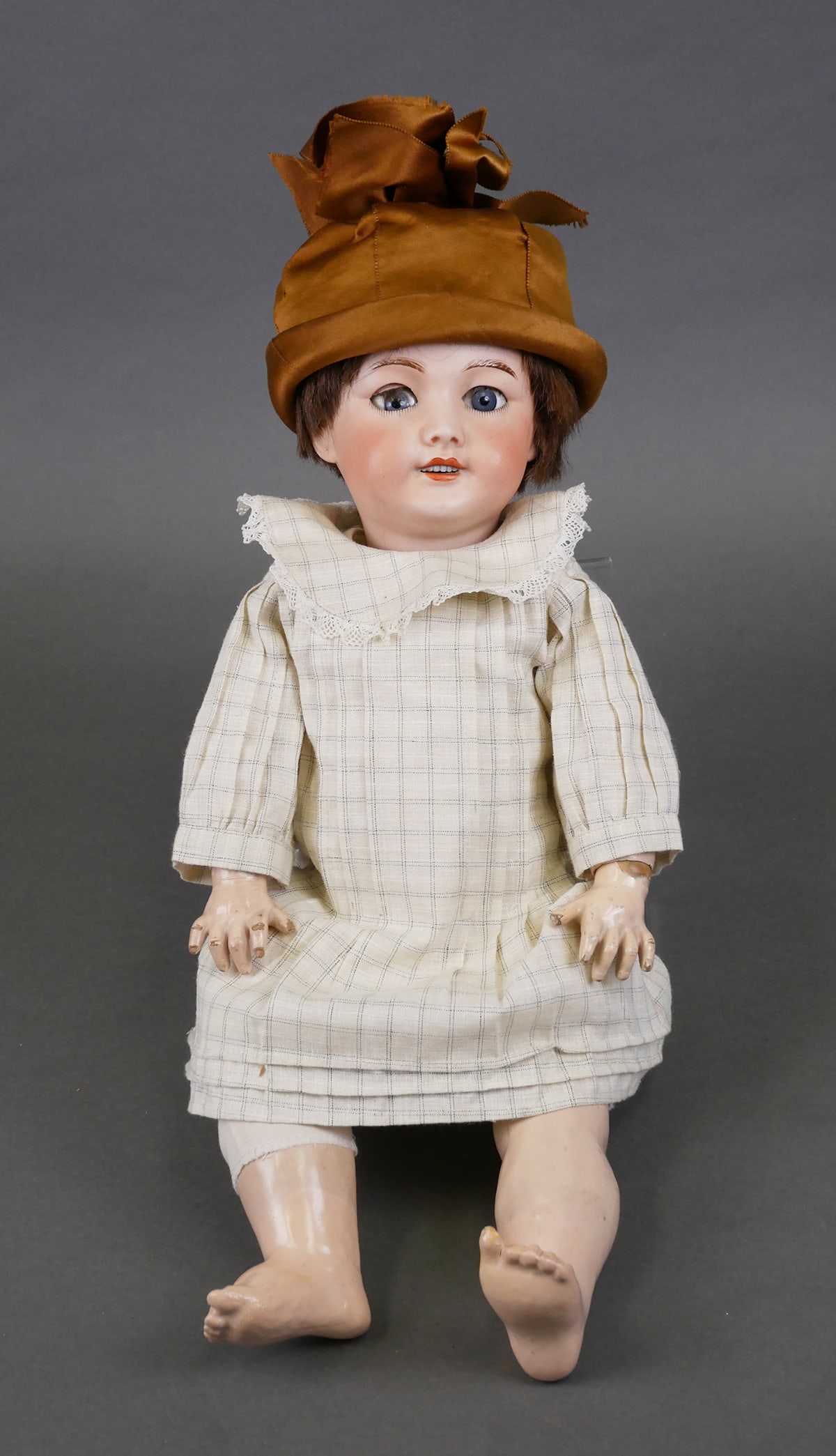 Antique French Bisque Head Doll SFBJ 301: SFBJ Tete Jumeau bebe doll, bisque porcelain head with composition body. Blue paperweight sleepy eyes retaining some of the original hair eyelashes, open mouth with teeth. Impressed mark of SFBJ 301 P