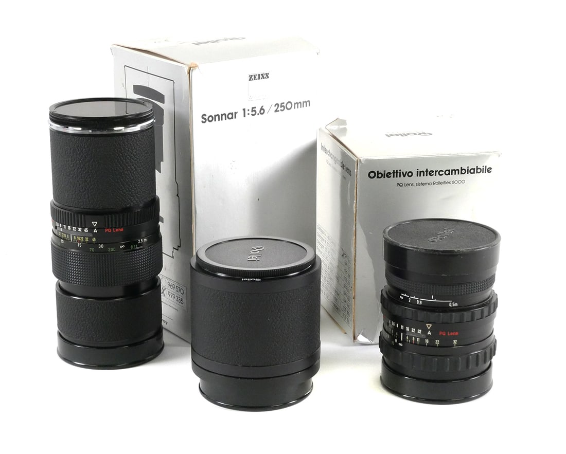Rollei PQ Lens Set: 40mm, 250mm & Adapter: Three-piece lens lot for the Rolleiflex 6000 system. Includes Carl Zeiss Distagon 40mm f/4 HFT wide-angle lens, serial number 7178680, and Rollei Sonnar 250mm f/5.6 telephoto lens, serial number 80871