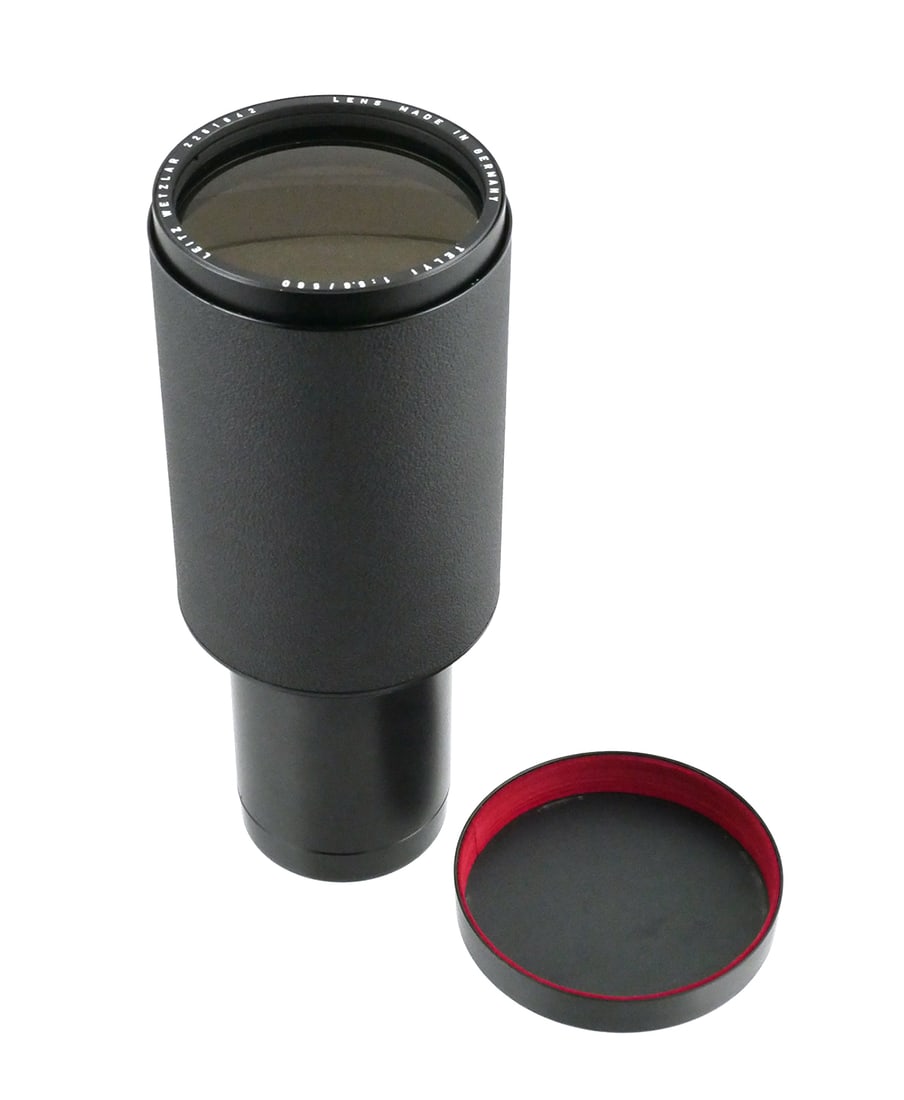 Leitz Telyt 560mm f/5.6 Lens in Box: Leitz Wetzlar Telyt 560mm f/5.6 lens, serial number 2261642, in original factory box marked 11867. Includes red velvet insert and matching serial number label. Exterior finish is consistent and unmarr