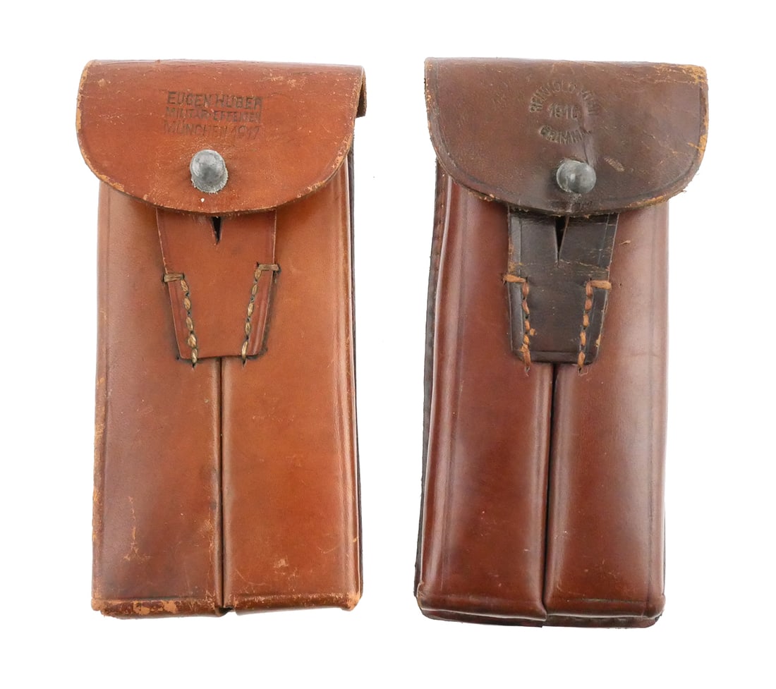 (2) German Luger Leather Magazine Pouch: Two WWI German Luger double magazine leather pouches. Marked "Reinhold Kuhn 1916 Grimma" & "Eugen Huber Militar Effekten Munchen 1917". TAGS P08, P.08, Artillery, Mag, ammo, belt, WW1, WWII, WW2. This