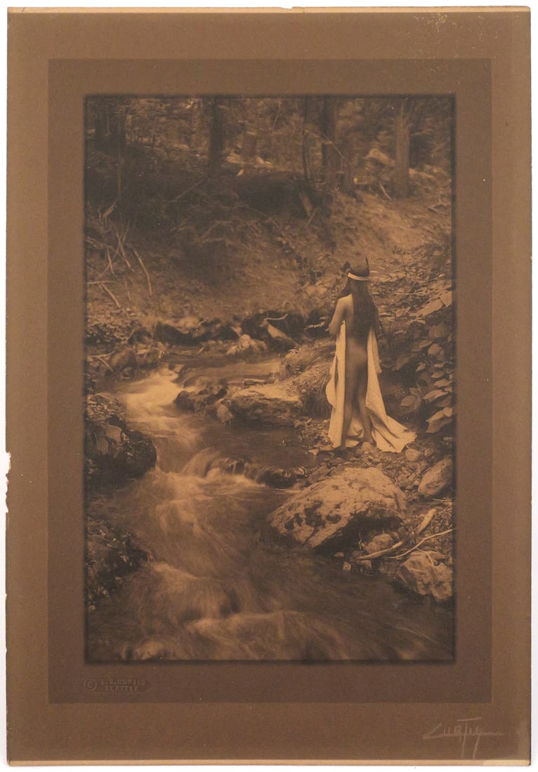 EDWARD S. CURTIS, Maid of Dreams, 1909 Print: Edward S. Curtis (1868–1952), Maid of Dreams. Platinum or platinum/palladium print, assumed process based on matte surface and absorbed tones. Image size approx. 7-1/2" x 4-7/8". Hand-signed “Curt