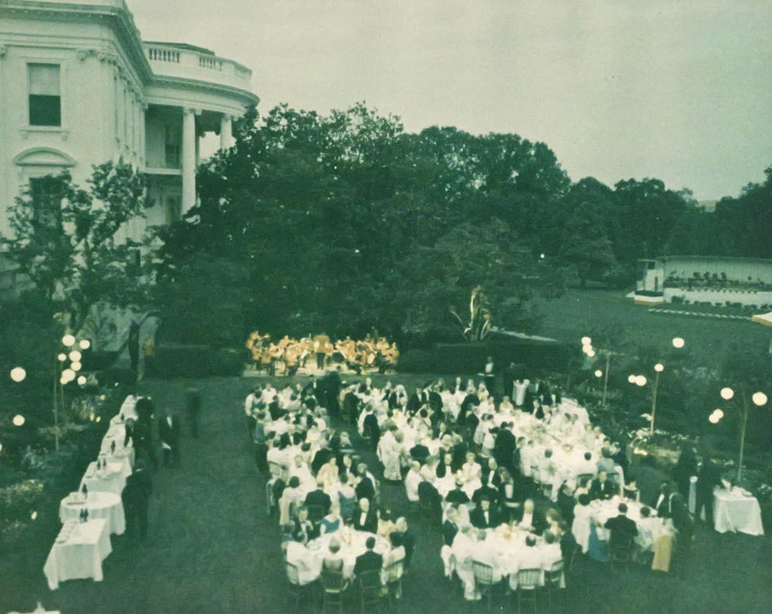 LBJ & Lady Bird Johnson, Signed Photo to WH Usher: Photograph of an event on the White House grounds, affixed to cream colored matting. Mat is inscribed and signed by Lady Bird Johnson, "To Mr. J.B. West -- who always loves to have our White House put