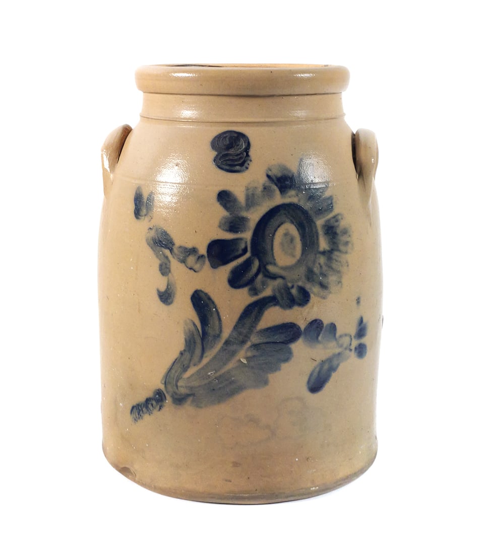 19C Stoneware Crock with Cobalt Flower, 2 gal: Salt-glazed stoneware crock with applied lug handles. Decorated on the front with a freehand cobalt floral design including a large blossom and leaves. Cylindrical form with rolled rim. No maker's mar