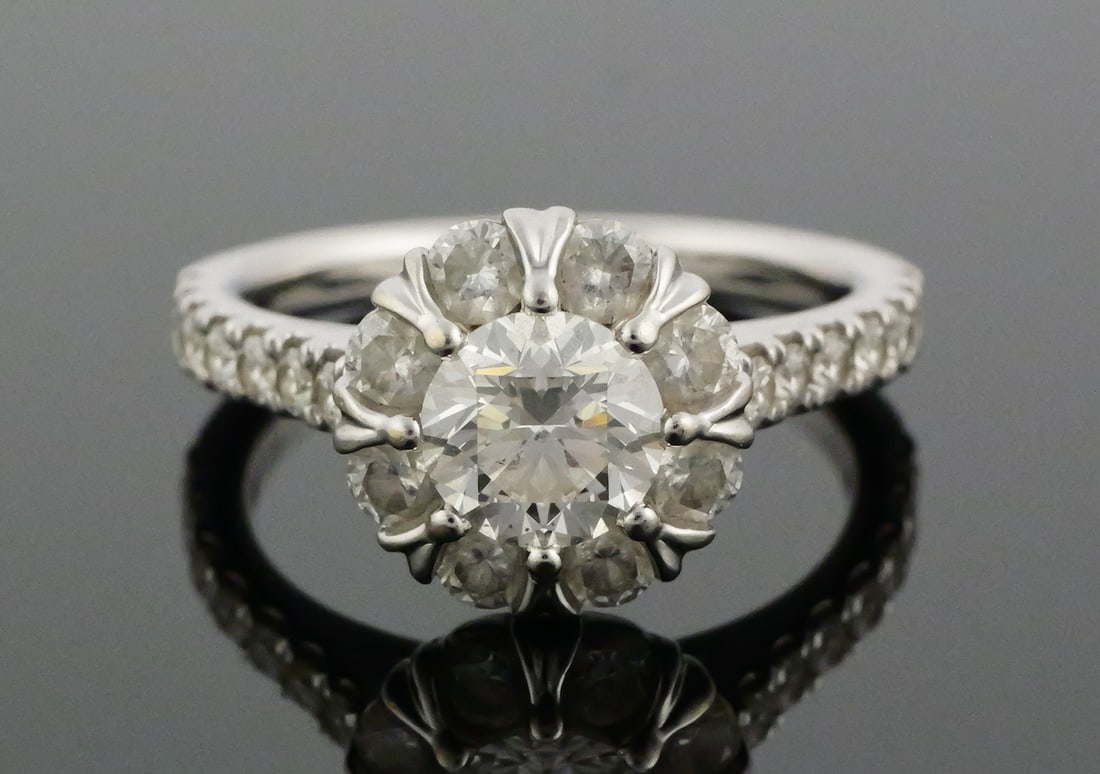 2 Carat Diamonds 14k White Gold Ring: 14k white gold mounting, about 5.6 grams total. One round brilliant one carat diamond main stone, color I, VS2, with excellent cut and polish, VG symmetry and no fluorescence (GIA report included, #73