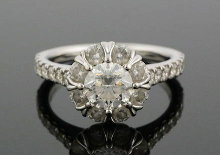 2 Carat Diamonds 14k White Gold Ring: 14k white gold mounting, about 5.6 grams total. One round brilliant one carat diamond main stone, color I, VS2, with excellent cut and polish, VG symmetry and no fluorescence (GIA report included,