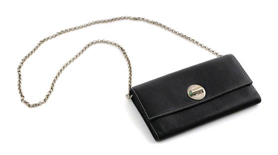 TIFFANY Italian Leather Turnlock Wallet COA: Tiffany & Co. black Italian leather shoulder bag turnlock wallet on chain. Silver hardware, lock accented with Tiffany Blue, Tiffany blue interior. With certificate of authenticity and cloth storage