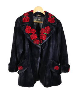 ZUKI Canadian Sheared Beaver Coat: Vintage black sheared beaver coat with floral design. Zuki Balaila, Canada. Rose accents on collar, pockets, and sleeve cuffs. Two hidden closures. Approx 18" shoulder to shoulder, 21"L sleeve, 29"