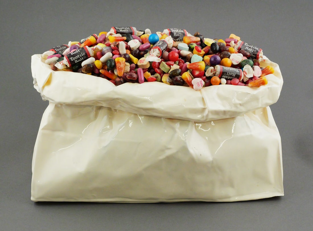 Tom Pergola Bag O' Sweets Mixed Media Sculpture: Tom Pergola Bag O' Sweets mixed media acrylic sculpture. Signed lower front, titled Bag O' Sweets and numbered 82/500 to verso. Wentworth Gallery label to verso. Cream-colored bag form overflowing wit