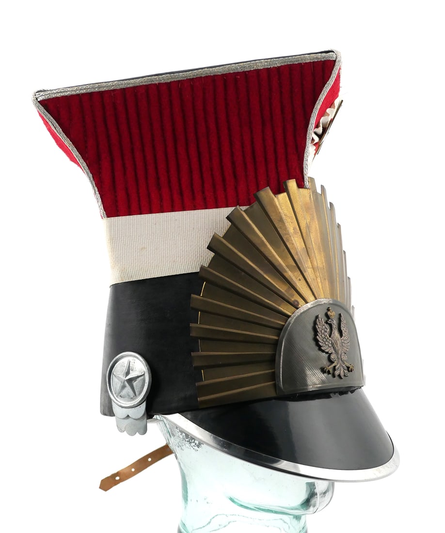 Polish Chapska By Jacek Jaworski: 1997 reproduction of a Polish Insurrection 1830 -1831 Cracov Cavalry Regimental Hat, made by Jacek Jaworski. Includes original documentation. Approx. 10" x 11-1/2". This item can be shipped in-house.