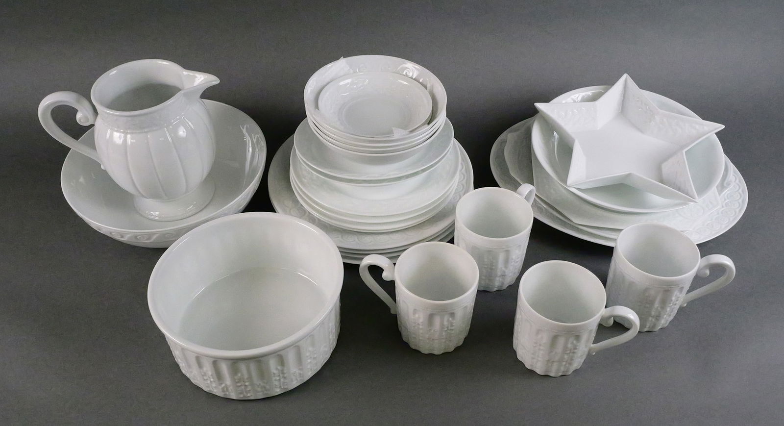 Bernardaud Limoges "Louvre" 28 Pc China Set: Bernardaud Limoges "Louvre" pattern dinnerware. Set includes a service of four with 10-3/8" dinner plates with "Flowers" decoration, 8-1/2" salad plates with "Laurel" decoration, coupe cereal bowls wi
