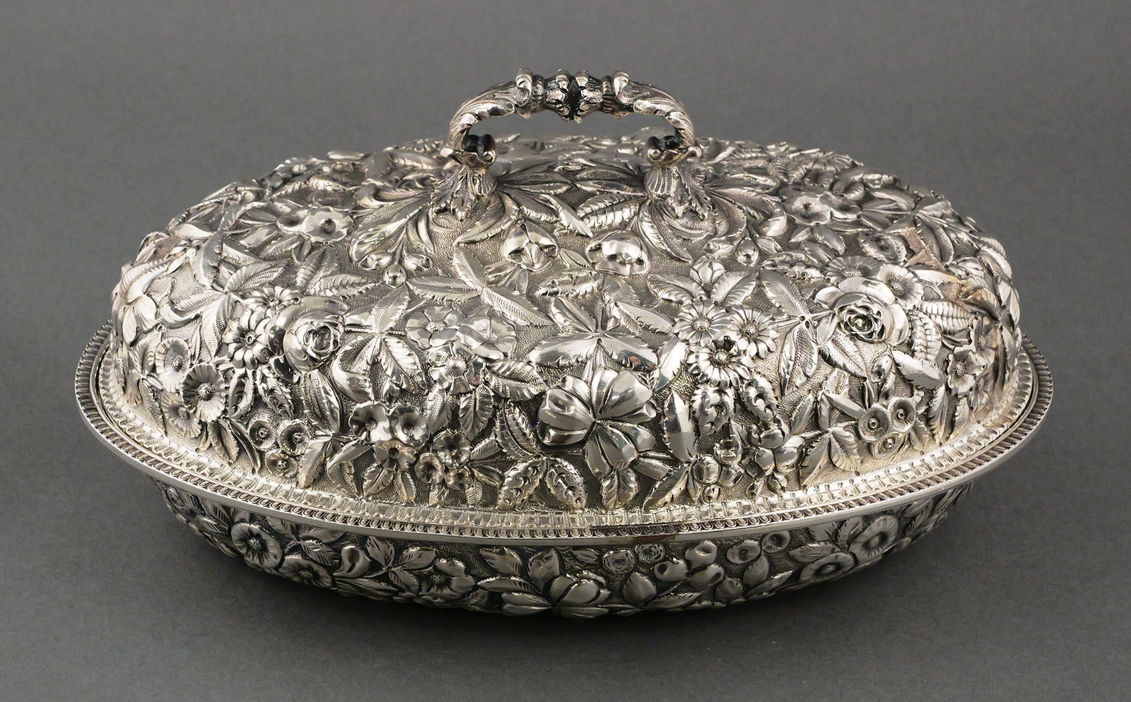 Baltimore Repousse Sterling Covered Bowl, Schultz: Stunning A.G. Schultz sterling silver repousse lidded oval serving bowl, circa 1900. Measures 10-7/8" wide, weighs 32.4 Troy ounces. This item can be shipped in-house. Multiple lot combined shipping