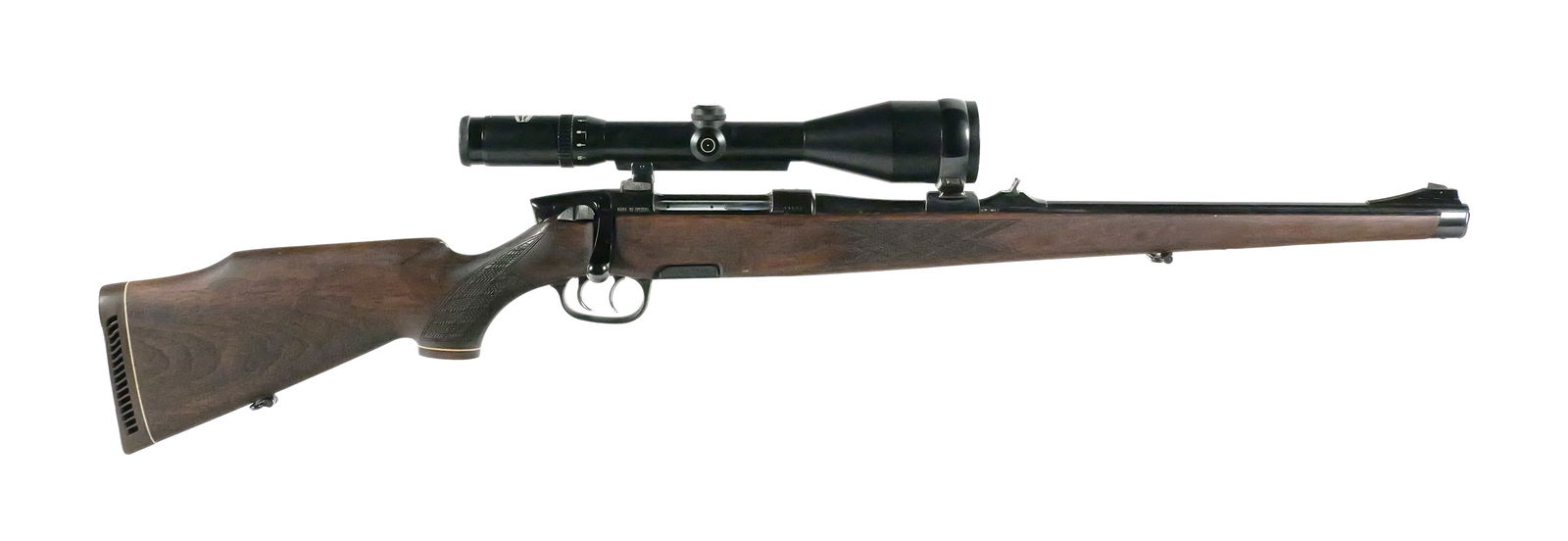 Steyr Mannlicher Model M Carbine Rifle & Scope: Steyr Mannlicher Mod. M bolt action carbine rifle. Made in Austria. 9.3x62 caliber. Serial #89523. 20" barrel. Schmidt & Bender / Biebertal Wetzlar 2-1/2 x 10x scope. 1 detachable rotary magazine