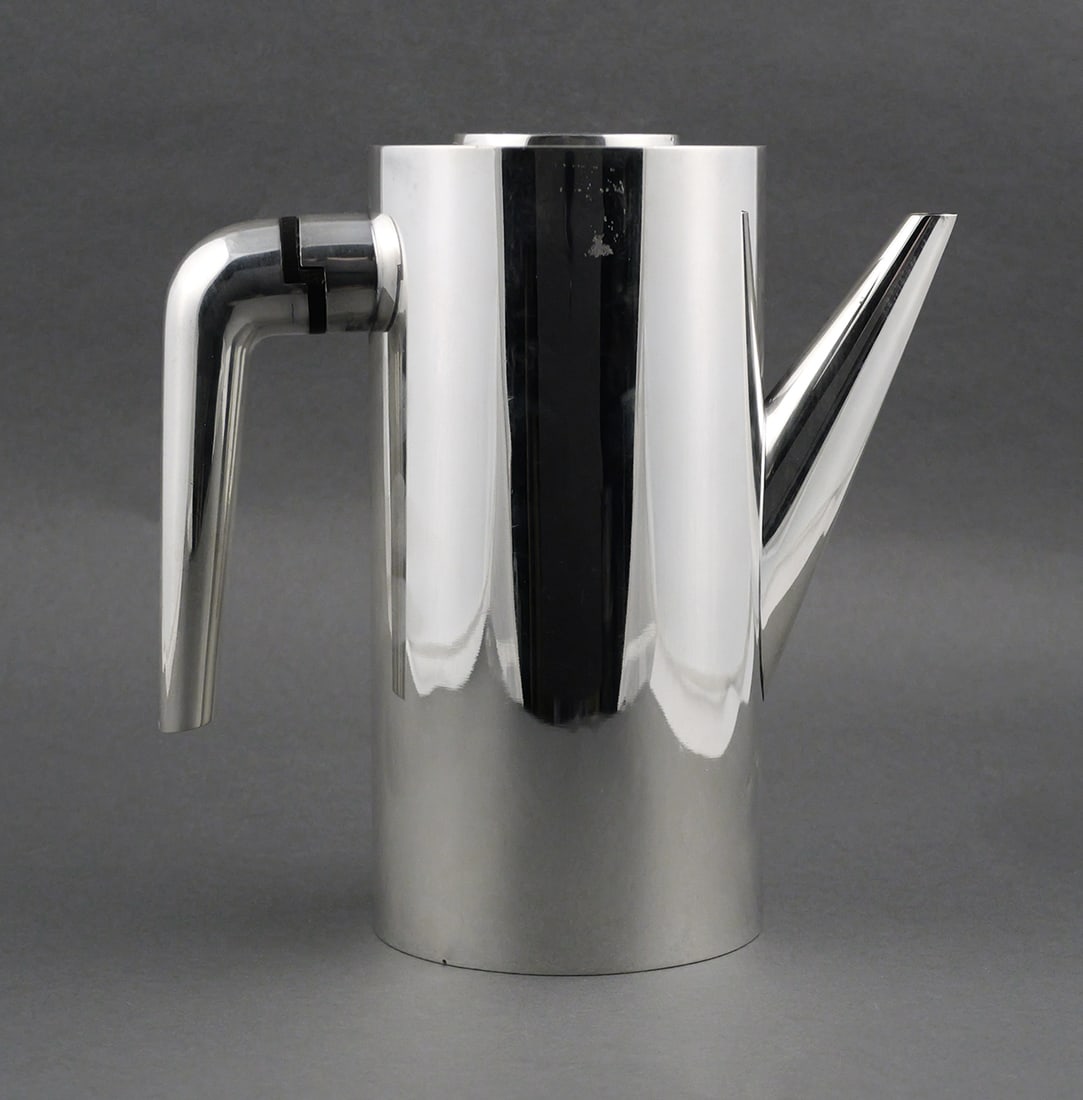 GEORG JENSEN MCM Sterling Coffee Pot: Exceedingly rare Georg Jensen sterling silver #1064 coffee or tea pot, about 9-1/8" high, weighing 42.6 ozt. SGJ (Soren Georg Jensen) mark on bottom indicates mid-century production. This item can be