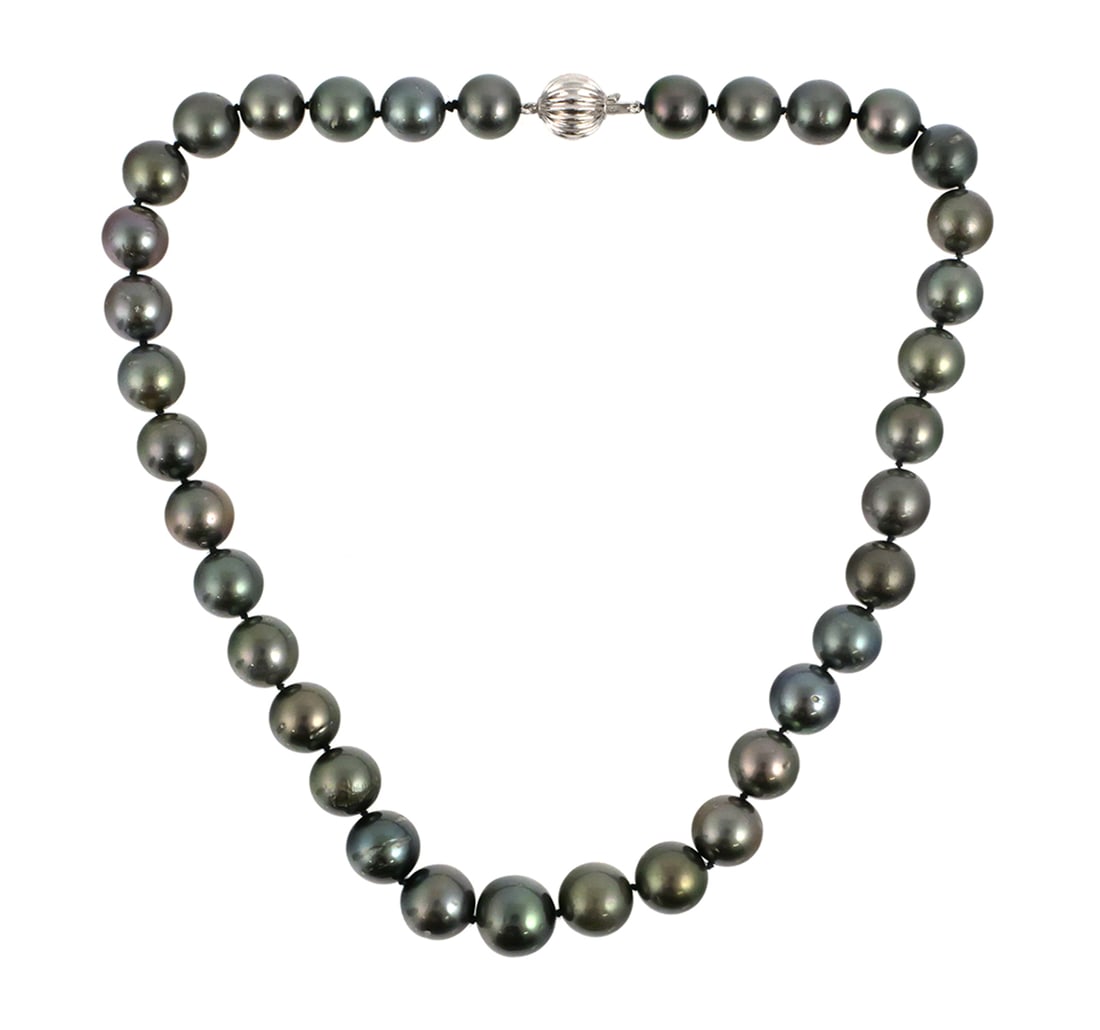 Tahitian Pearl Necklace, GIA Certified: Single-strand cultured Tahitian pearl necklace. GIA Report No. 2235692340. Thirty-five near-round pearls measuring approximately 11.0 mm to 13.5 mm in diameter. Dark gray body color with no overtone.