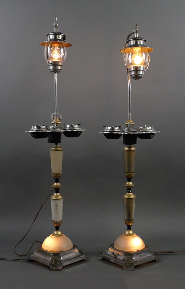 Mico Art Deco Smoking Stand Pair: Pair of Mico vintage early 20th century c. 1930 smoking stands. Hanging ship's lantern design with electric lighter, two ashtrays, and covered cigarette jar. Ashtrays and cigarette holder with metal