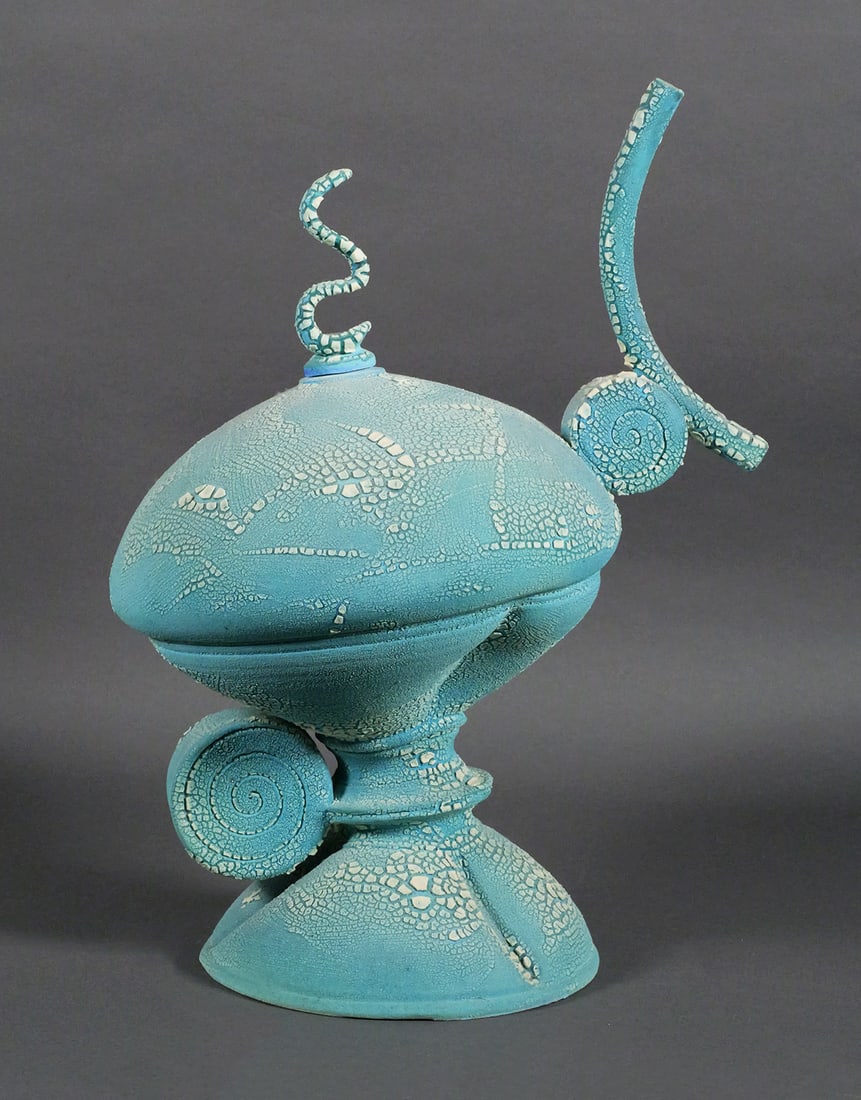 Blue Studio Ceramic Abstract Sculpture: Studio ceramic abstract sculpture in textured crackle glaze finish. Features organic rounded form with applied coiled and curved extensions. Artist's impressed seal mark visible on body. Measures 24"