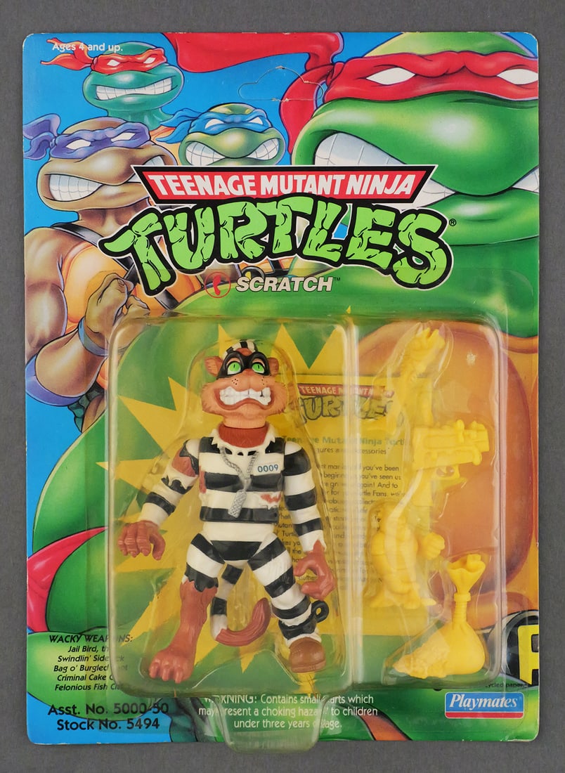 TMNT 1993 SCRATCH Action Figure, MOC: Playmates Teenage Mutant Ninja Turtles action figure of Scratch, on unpunched card. A villain in the TMNT line, and a key late-run rarity. This item can be shipped in-house. Multiple lot combined ship