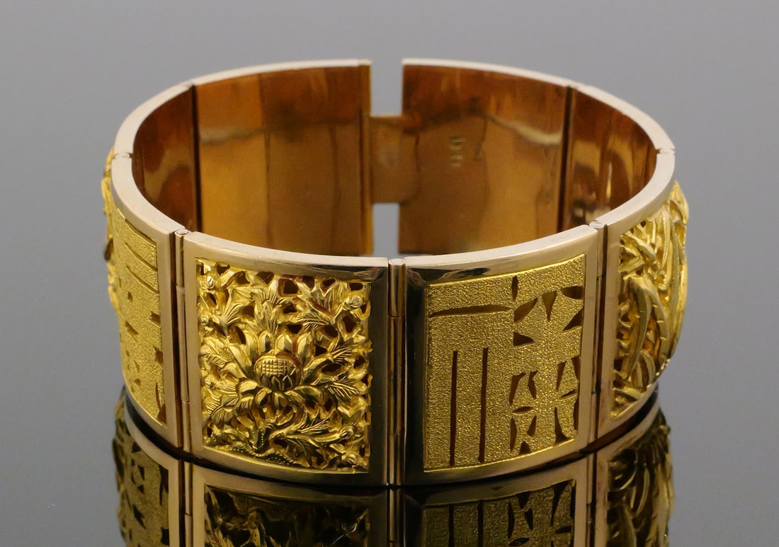 Vintage 18k Gold Deco Panel Bracelet, Signed: Stunning eight-panel 18k gold bracelet. About 1" wide panels alternate between stylized Chinese characters and relief openwork depictions of birds and flowers. Total weight 64.5 grams. Signed 18k and