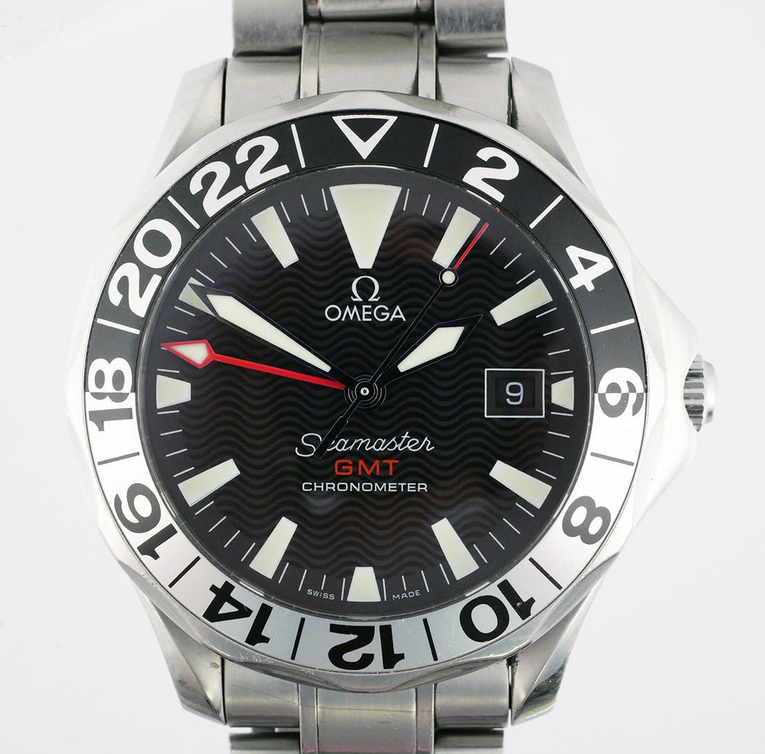Omega Seamaster 300 GMT 50th Anniversary: Omega Seamaster Professional GMT 50th Anniversary 2234.50 with original certificates and warranty cards, Omega premium travel pouch, hard shell with zipper. Steel bracelet approx. 7-1/2" closed. This